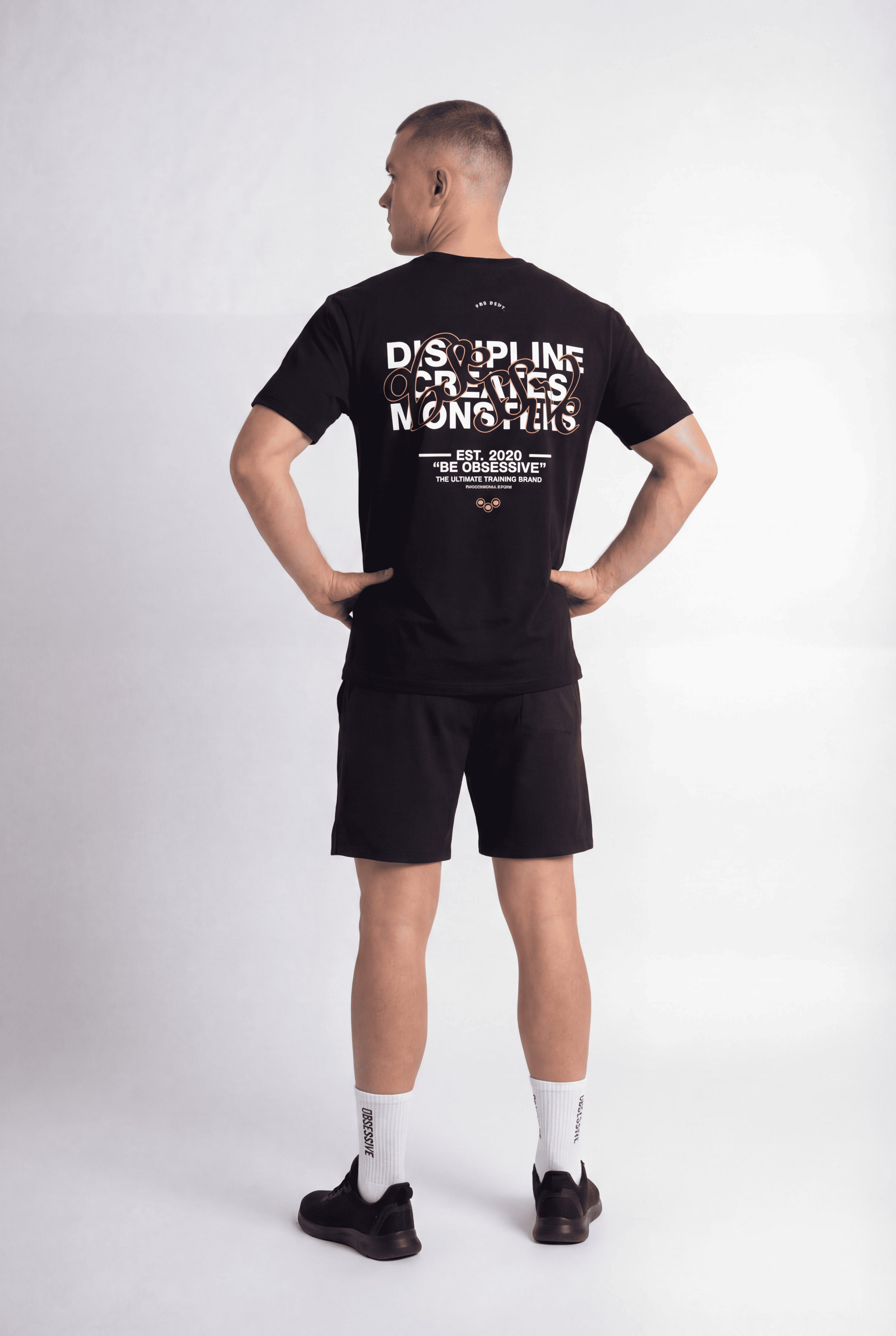 DISCIPLINE CREATES MONSTERS OVERSIZED T-SHIRT - NEGRO