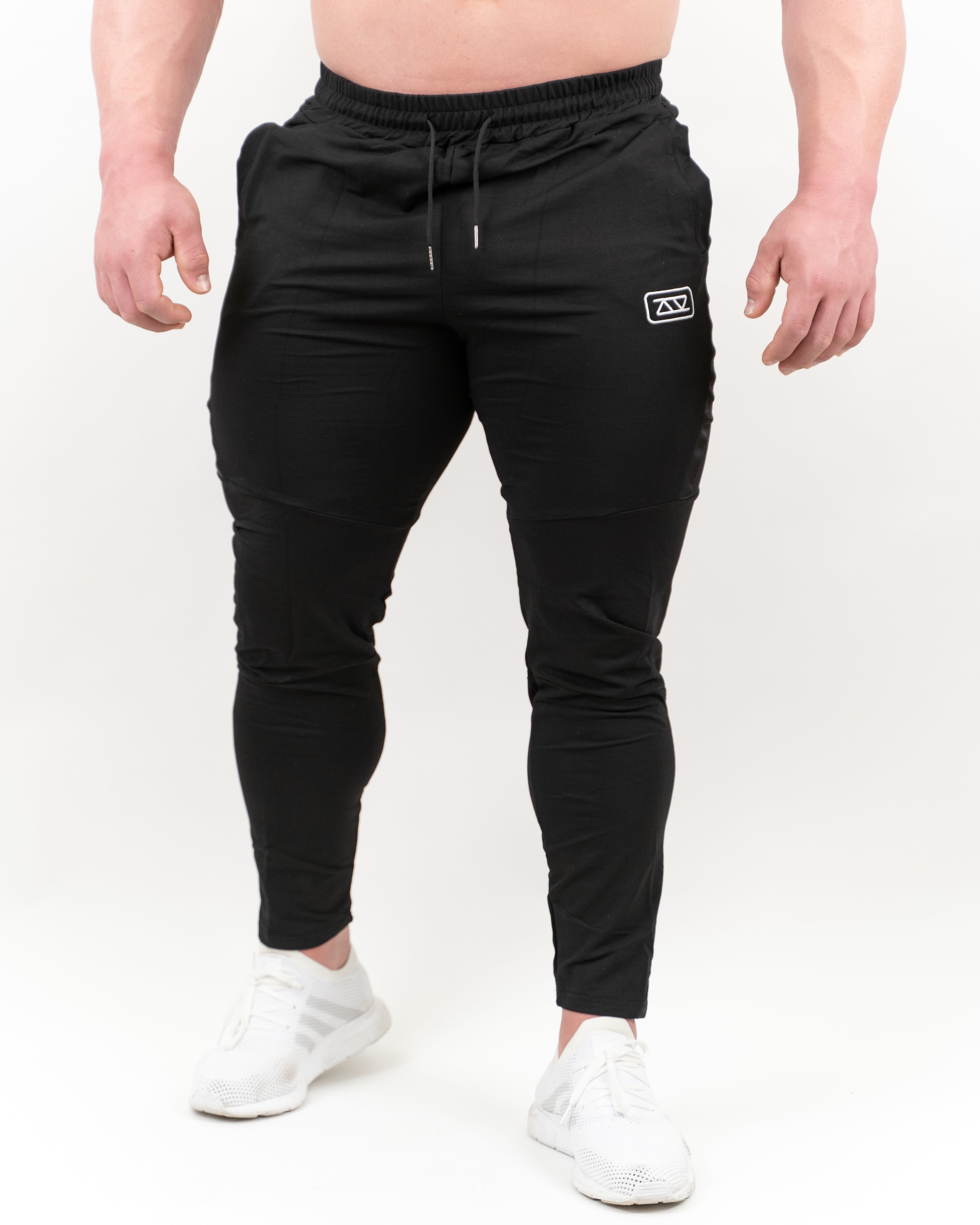 PANTALONES LARGOS TECH - NEGRO