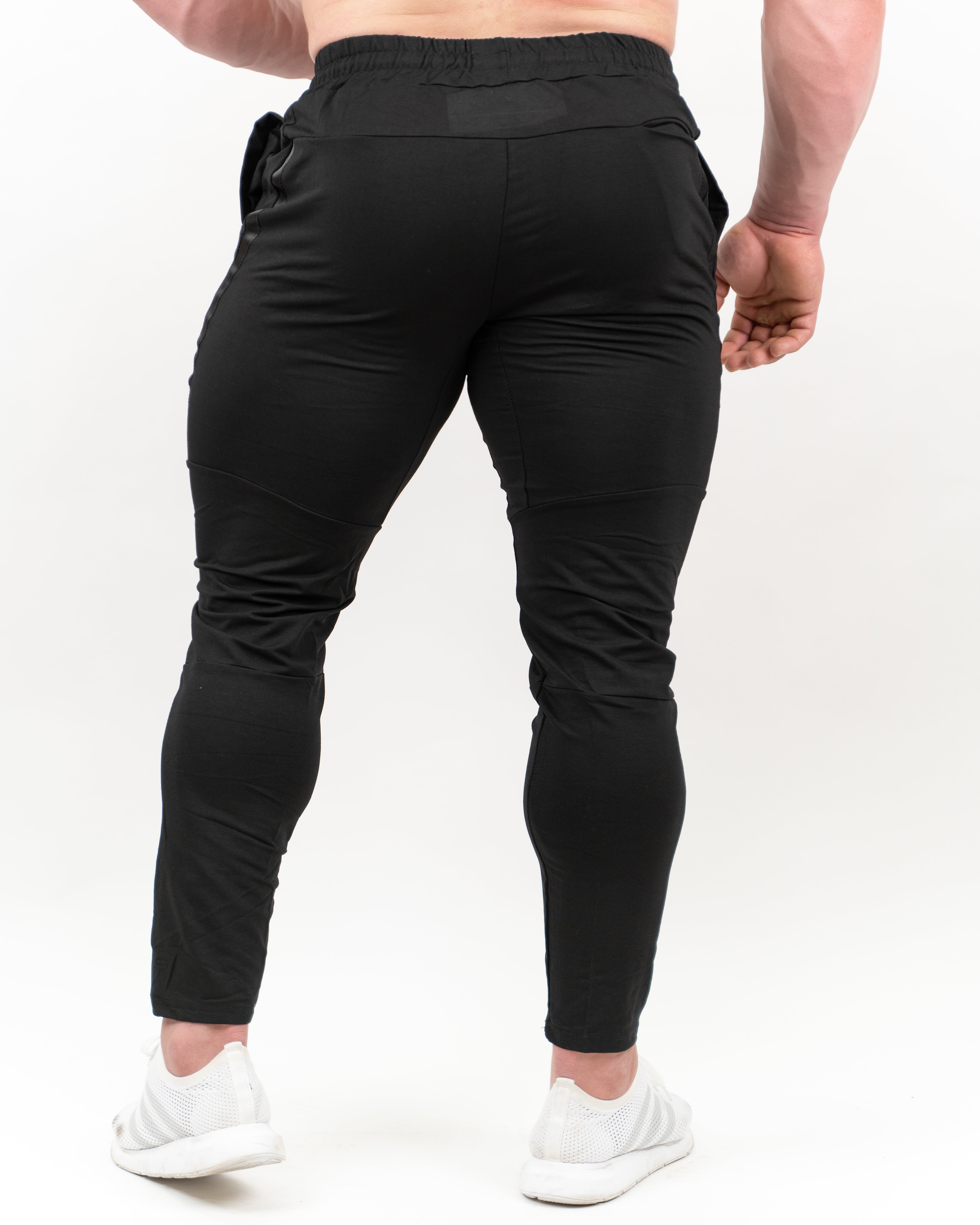 PANTALONES LARGOS TECH - NEGRO