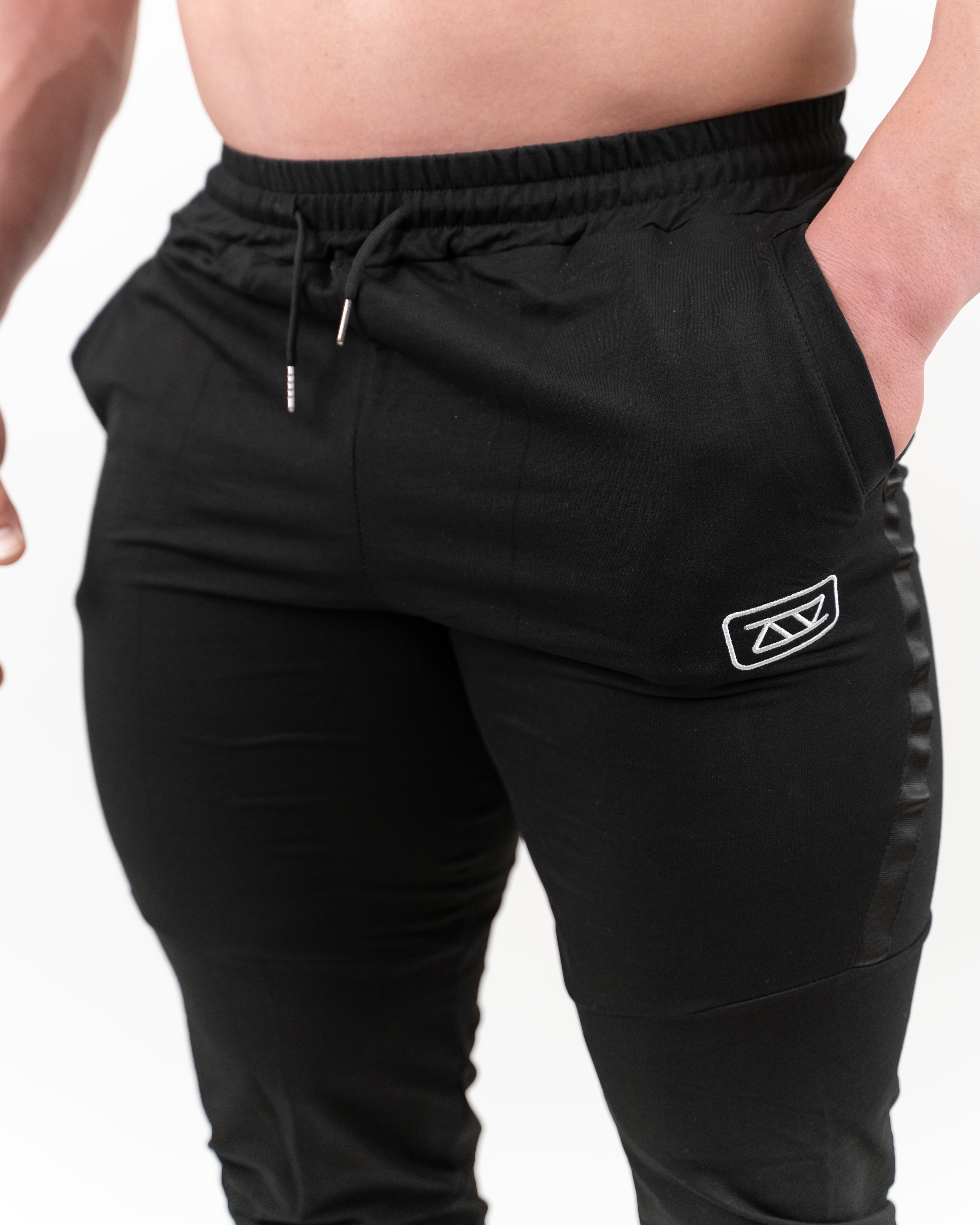 PANTALONES LARGOS TECH - NEGRO