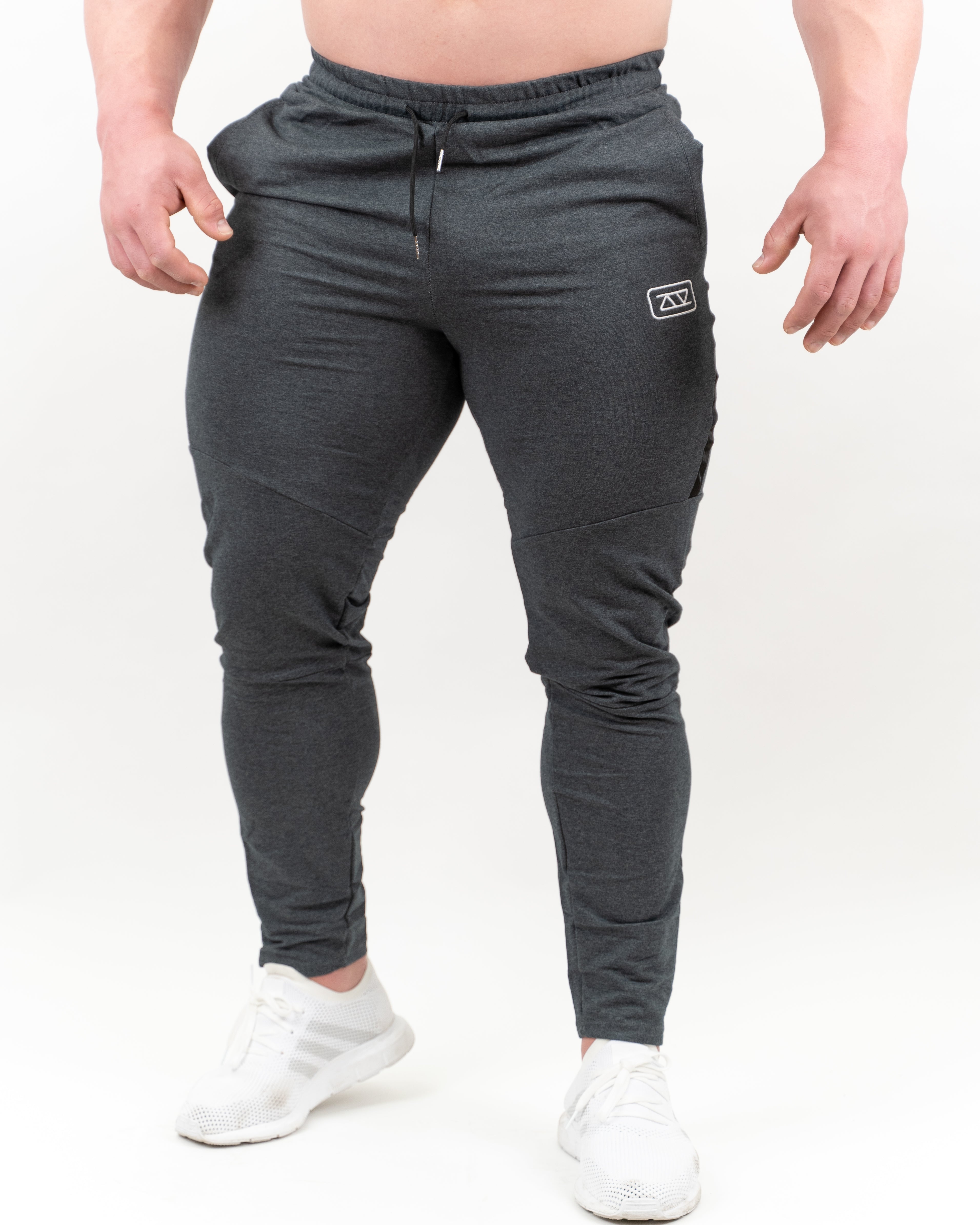 PANTALONES LARGOS TECH - GRIS